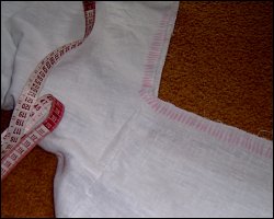 The markings for the gathers on the huuuge cleavage.